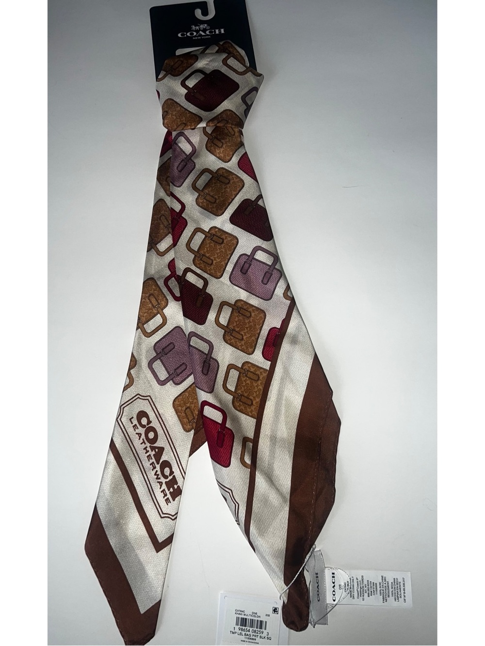NWT COACH Ivory Silk Tie with Brown, Burgundy and Mauve Satchel Pattern